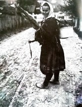 A woman from Žagubica district, multi-tasking